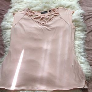It’s a very soft light baby pink in a size medium
